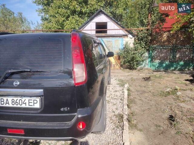 Черный Ниссан ИксТрейл, объемом двигателя 2.18 л и пробегом 259 тыс. км за 6000 $, фото 7 на Automoto.ua