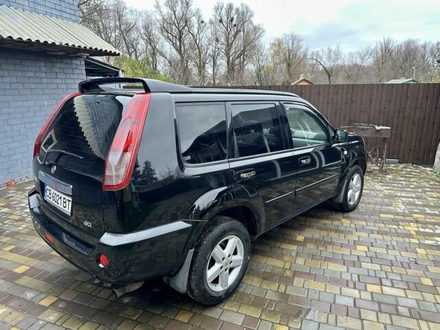 Черный Ниссан ИксТрейл, объемом двигателя 2.2 л и пробегом 168 тыс. км за 6699 $, фото 2 на Automoto.ua