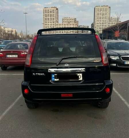 Черный Ниссан ИксТрейл, объемом двигателя 2.5 л и пробегом 261 тыс. км за 8300 $, фото 16 на Automoto.ua