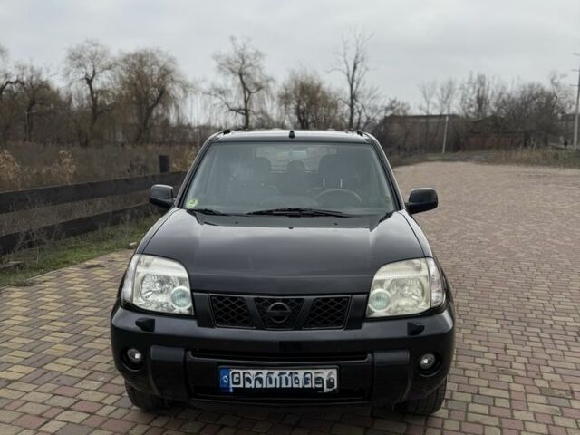 Черный Ниссан ИксТрейл, объемом двигателя 2.2 л и пробегом 249 тыс. км за 2600 $, фото 1 на Automoto.ua