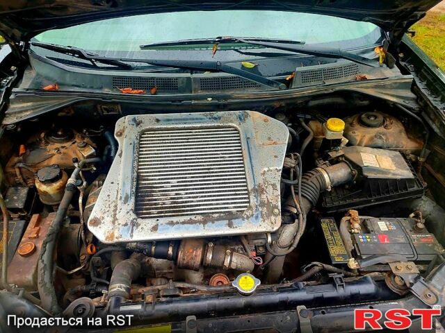 Черный Ниссан ИксТрейл, объемом двигателя 2.2 л и пробегом 248 тыс. км за 3800 $, фото 5 на Automoto.ua