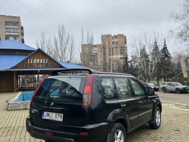 Чорний Ніссан ІксТрейл, об'ємом двигуна 2.2 л та пробігом 200 тис. км за 2600 $, фото 5 на Automoto.ua