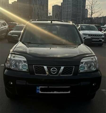 Черный Ниссан ИксТрейл, объемом двигателя 2.5 л и пробегом 261 тыс. км за 8300 $, фото 6 на Automoto.ua