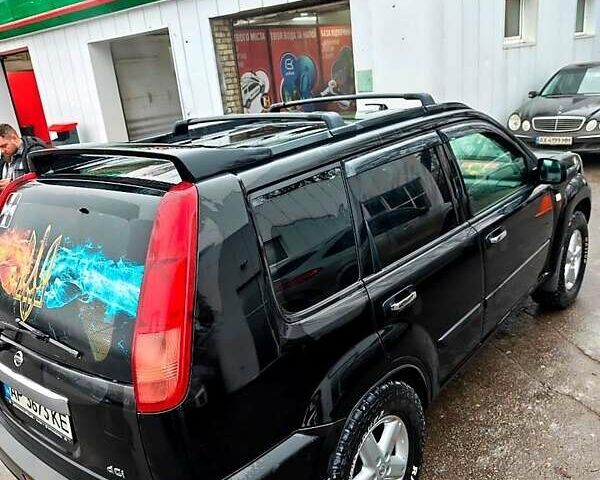 Черный Ниссан ИксТрейл, объемом двигателя 2.2 л и пробегом 100 тыс. км за 5500 $, фото 2 на Automoto.ua