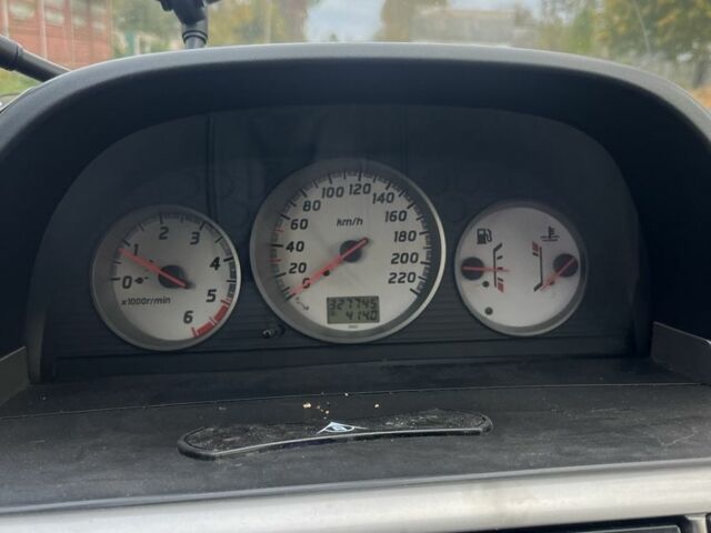 Черный Ниссан ИксТрейл, объемом двигателя 2.2 л и пробегом 327 тыс. км за 3600 $, фото 9 на Automoto.ua