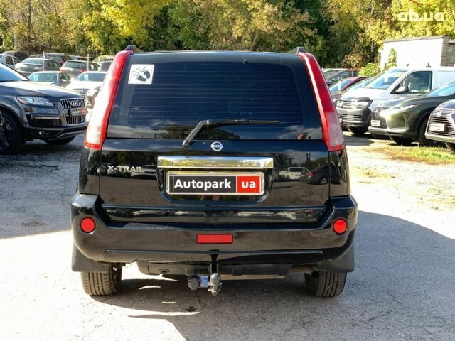 Черный Ниссан ИксТрейл, объемом двигателя 2.5 л и пробегом 295 тыс. км за 6890 $, фото 5 на Automoto.ua