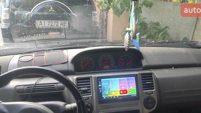 Черный Ниссан ИксТрейл, объемом двигателя 2 л и пробегом 430 тыс. км за 5300 $, фото 9 на Automoto.ua
