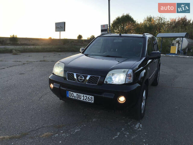 Чорний Ніссан ІксТрейл, об'ємом двигуна 2.2 л та пробігом 250 тис. км за 4199 $, фото 1 на Automoto.ua