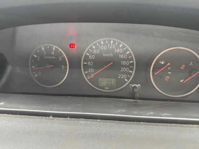 Черный Ниссан ИксТрейл, объемом двигателя 2.2 л и пробегом 306 тыс. км за 2379 $, фото 10 на Automoto.ua