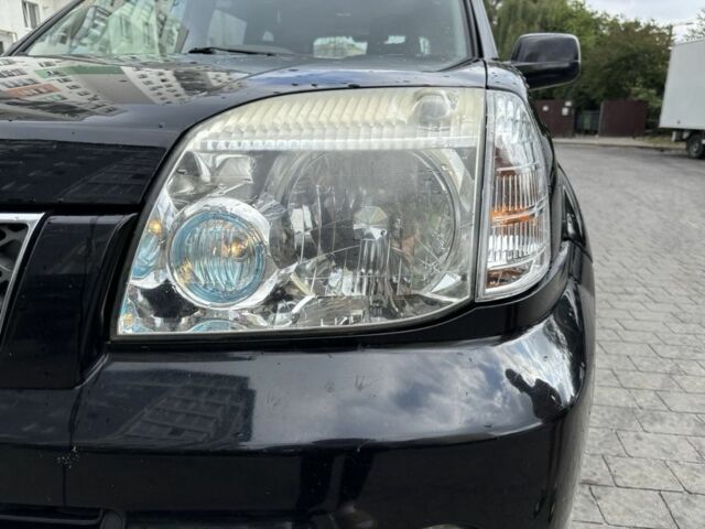 Черный Ниссан ИксТрейл, объемом двигателя 2.2 л и пробегом 206 тыс. км за 4200 $, фото 2 на Automoto.ua