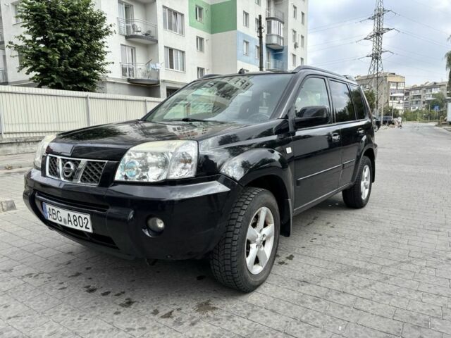 Черный Ниссан ИксТрейл, объемом двигателя 2.2 л и пробегом 206 тыс. км за 4200 $, фото 1 на Automoto.ua