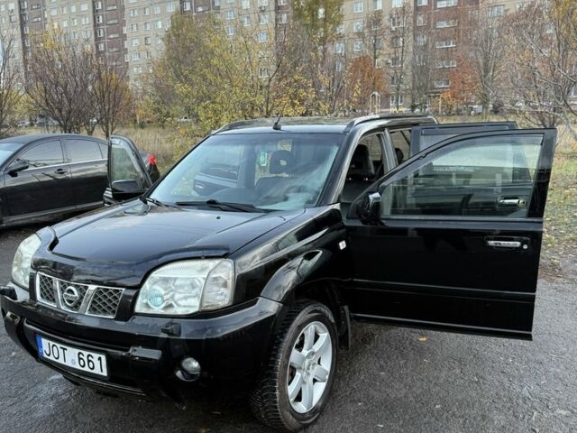 Черный Ниссан ИксТрейл, объемом двигателя 2.2 л и пробегом 306 тыс. км за 3800 $, фото 2 на Automoto.ua