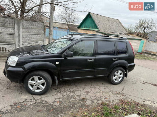 Чорний Ніссан ІксТрейл, об'ємом двигуна 2.2 л та пробігом 290 тис. км за 3750 $, фото 6 на Automoto.ua