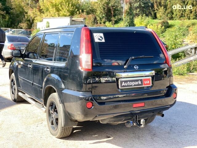 Черный Ниссан ИксТрейл, объемом двигателя 2.5 л и пробегом 295 тыс. км за 6890 $, фото 6 на Automoto.ua