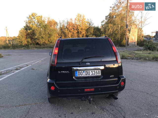 Чорний Ніссан ІксТрейл, об'ємом двигуна 2.2 л та пробігом 250 тис. км за 4199 $, фото 7 на Automoto.ua