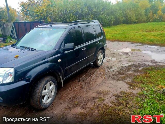 Черный Ниссан ИксТрейл, объемом двигателя 2.2 л и пробегом 248 тыс. км за 3800 $, фото 2 на Automoto.ua