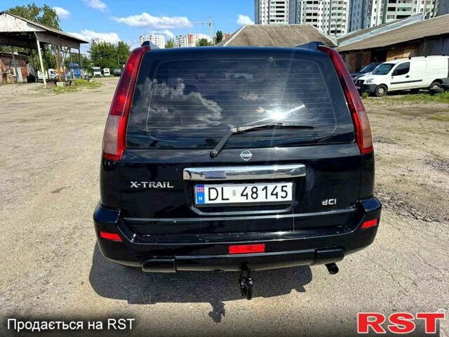 Черный Ниссан ИксТрейл, объемом двигателя 2.2 л и пробегом 239 тыс. км за 3800 $, фото 5 на Automoto.ua