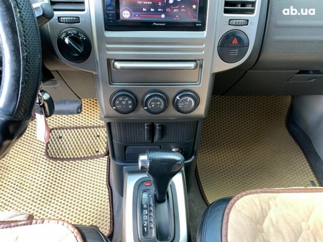 Черный Ниссан ИксТрейл, объемом двигателя 2.5 л и пробегом 295 тыс. км за 6890 $, фото 34 на Automoto.ua