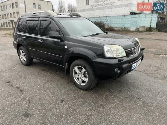 Черный Ниссан ИксТрейл, объемом двигателя 2.5 л и пробегом 285 тыс. км за 6500 $, фото 7 на Automoto.ua