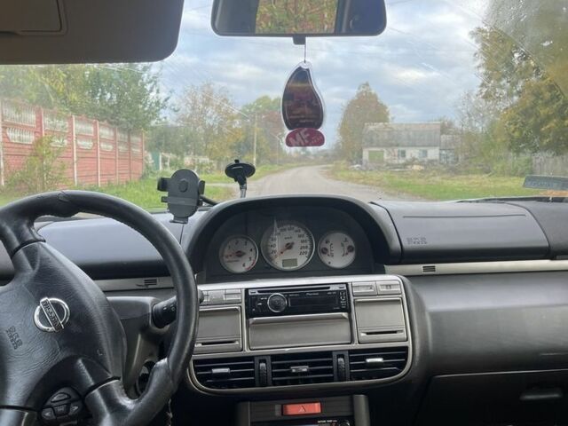 Черный Ниссан ИксТрейл, объемом двигателя 2.2 л и пробегом 327 тыс. км за 3600 $, фото 6 на Automoto.ua