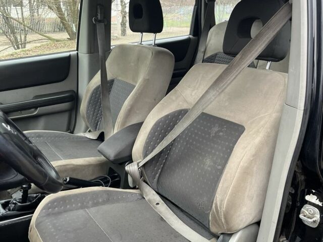 Чорний Ніссан ІксТрейл, об'ємом двигуна 2.2 л та пробігом 200 тис. км за 2600 $, фото 11 на Automoto.ua