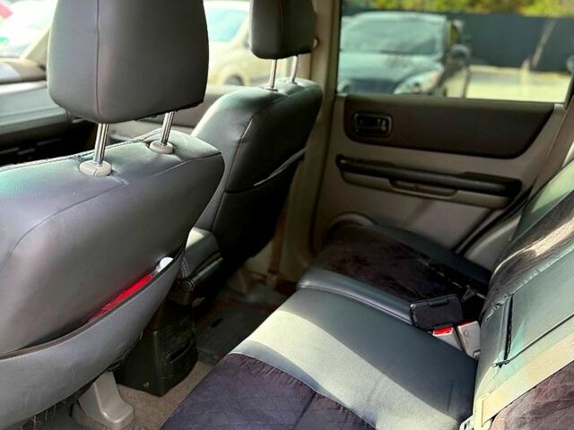 Черный Ниссан ИксТрейл, объемом двигателя 2.2 л и пробегом 360 тыс. км за 7300 $, фото 10 на Automoto.ua