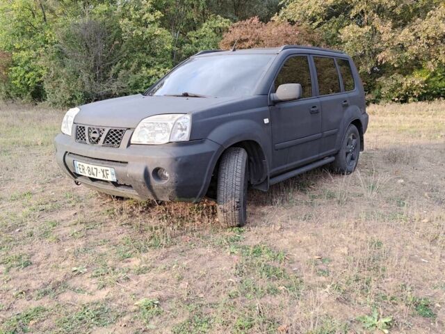 Черный Ниссан ИксТрейл, объемом двигателя 2.2 л и пробегом 290 тыс. км за 4200 $, фото 1 на Automoto.ua