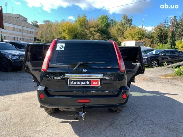 Черный Ниссан ИксТрейл, объемом двигателя 2.5 л и пробегом 295 тыс. км за 6890 $, фото 13 на Automoto.ua