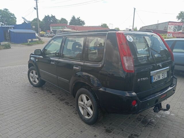 Чорний Ніссан ІксТрейл, об'ємом двигуна 2.2 л та пробігом 218 тис. км за 3500 $, фото 4 на Automoto.ua