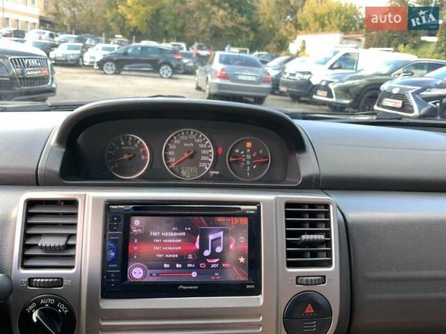 Черный Ниссан ИксТрейл, объемом двигателя 2.5 л и пробегом 295 тыс. км за 6890 $, фото 32 на Automoto.ua