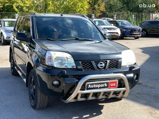 Черный Ниссан ИксТрейл, объемом двигателя 2.5 л и пробегом 295 тыс. км за 6890 $, фото 2 на Automoto.ua