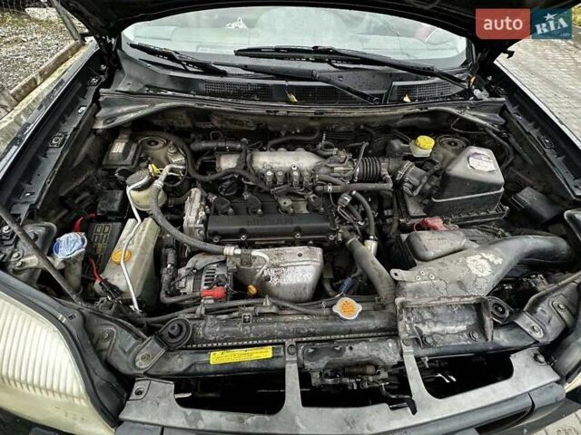 Черный Ниссан ИксТрейл, объемом двигателя 2.5 л и пробегом 282 тыс. км за 6250 $, фото 11 на Automoto.ua