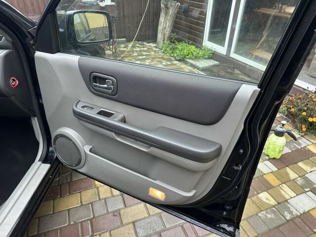 Черный Ниссан ИксТрейл, объемом двигателя 2.2 л и пробегом 168 тыс. км за 6699 $, фото 12 на Automoto.ua