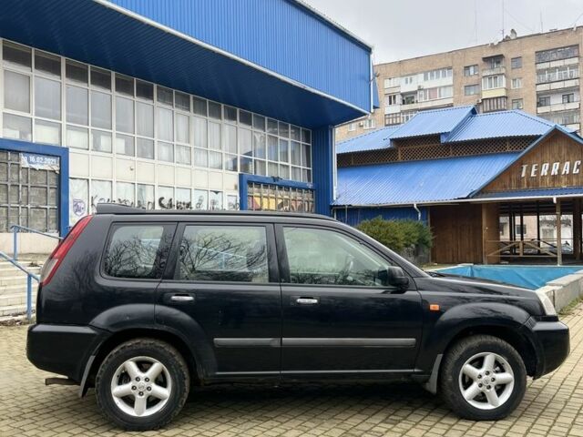 Чорний Ніссан ІксТрейл, об'ємом двигуна 2.2 л та пробігом 200 тис. км за 2600 $, фото 6 на Automoto.ua