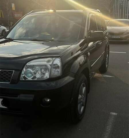 Черный Ниссан ИксТрейл, объемом двигателя 2.5 л и пробегом 261 тыс. км за 8300 $, фото 7 на Automoto.ua