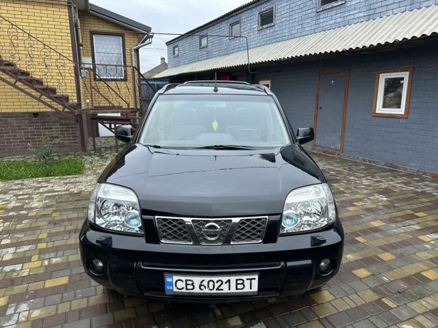 Черный Ниссан ИксТрейл, объемом двигателя 2.2 л и пробегом 168 тыс. км за 6699 $, фото 3 на Automoto.ua