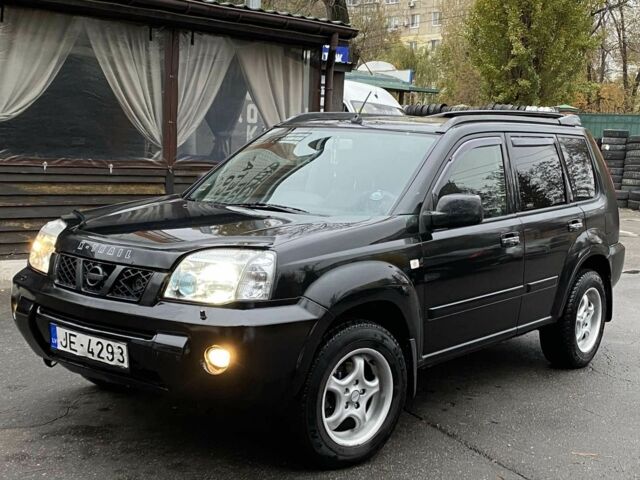 Черный Ниссан ИксТрейл, объемом двигателя 2.2 л и пробегом 226 тыс. км за 3650 $, фото 1 на Automoto.ua