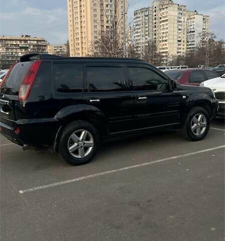 Черный Ниссан ИксТрейл, объемом двигателя 2.5 л и пробегом 261 тыс. км за 8300 $, фото 1 на Automoto.ua