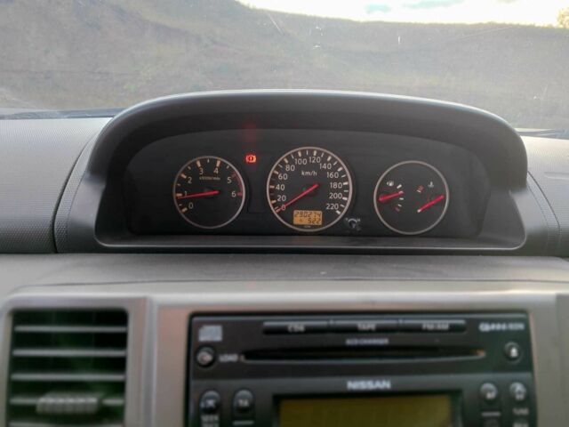 Черный Ниссан ИксТрейл, объемом двигателя 2.2 л и пробегом 290 тыс. км за 4200 $, фото 9 на Automoto.ua