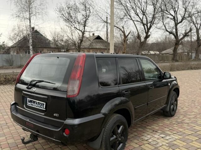 Черный Ниссан ИксТрейл, объемом двигателя 2.2 л и пробегом 249 тыс. км за 2600 $, фото 5 на Automoto.ua