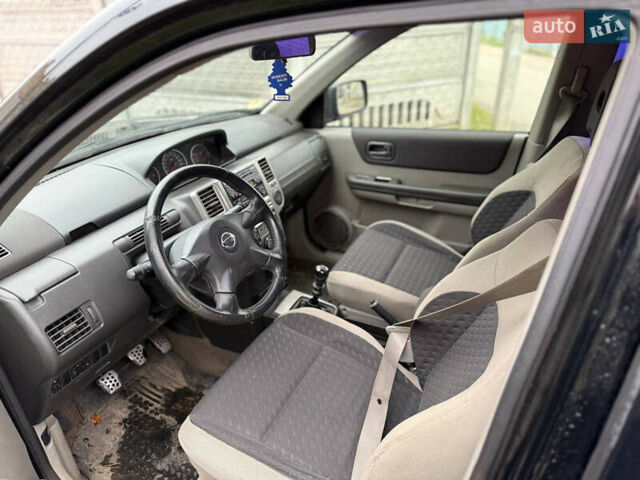 Чорний Ніссан ІксТрейл, об'ємом двигуна 2.2 л та пробігом 290 тис. км за 3750 $, фото 7 на Automoto.ua