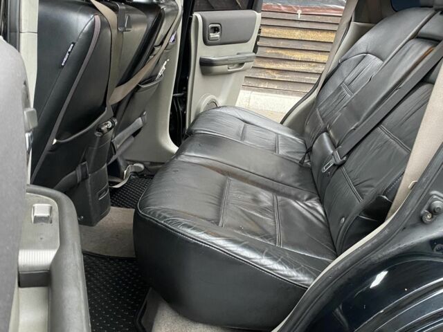 Черный Ниссан ИксТрейл, объемом двигателя 2.2 л и пробегом 226 тыс. км за 3650 $, фото 10 на Automoto.ua