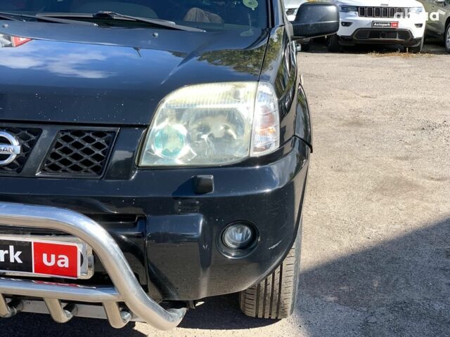 Черный Ниссан ИксТрейл, объемом двигателя 2.5 л и пробегом 295 тыс. км за 6890 $, фото 8 на Automoto.ua