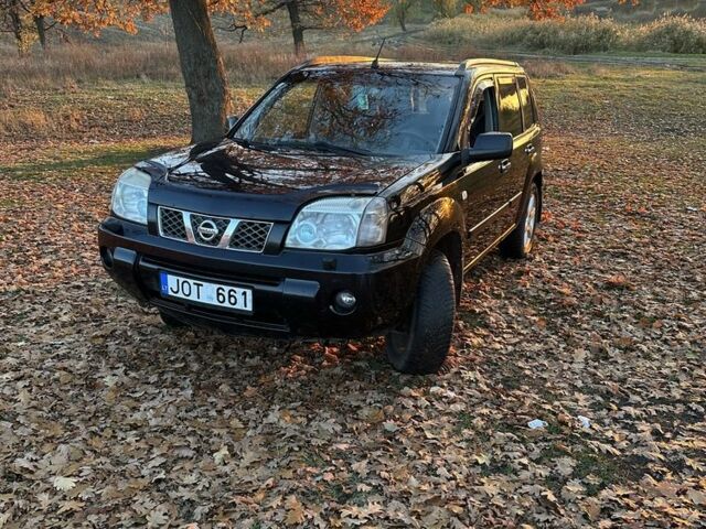 Черный Ниссан ИксТрейл, объемом двигателя 2.2 л и пробегом 306 тыс. км за 3300 $, фото 1 на Automoto.ua