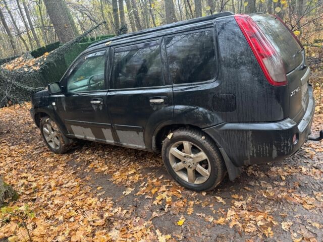 Черный Ниссан ИксТрейл, объемом двигателя 2.2 л и пробегом 306 тыс. км за 2379 $, фото 2 на Automoto.ua