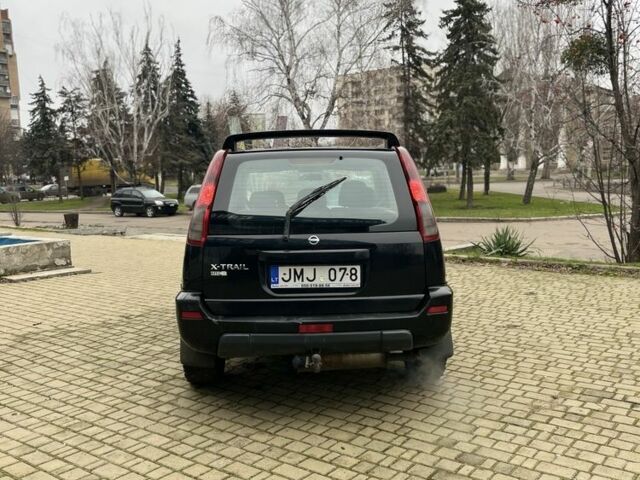 Чорний Ніссан ІксТрейл, об'ємом двигуна 2.2 л та пробігом 200 тис. км за 2600 $, фото 4 на Automoto.ua