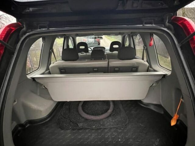 Черный Ниссан ИксТрейл, объемом двигателя 2.2 л и пробегом 270 тыс. км за 3900 $, фото 4 на Automoto.ua