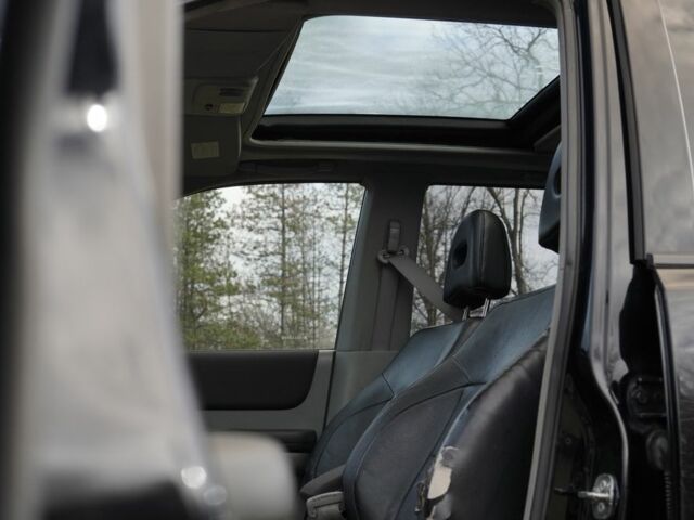 Черный Ниссан ИксТрейл, объемом двигателя 2.2 л и пробегом 273 тыс. км за 4267 $, фото 11 на Automoto.ua