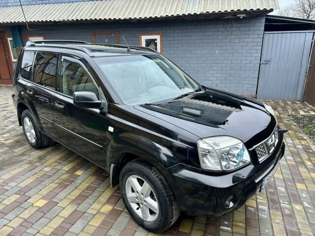 Черный Ниссан ИксТрейл, объемом двигателя 2.2 л и пробегом 168 тыс. км за 6699 $, фото 1 на Automoto.ua