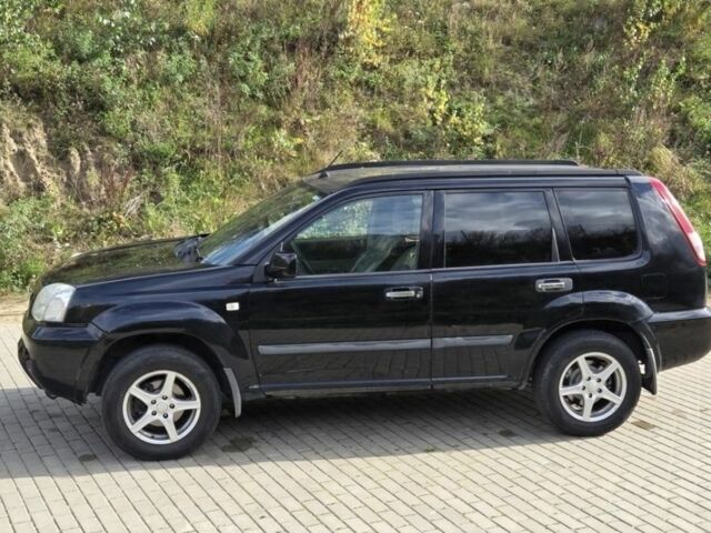 Черный Ниссан ИксТрейл, объемом двигателя 2.2 л и пробегом 220 тыс. км за 2250 $, фото 1 на Automoto.ua